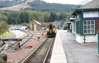 An Oban - Glasgow train at Crianlarich in April 2005 awaiting the arrival of the service from Fort William before proceeding south as one.<br><br>[John Furnevel 16/04/2005]