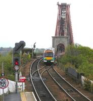 A train from Edinburgh comes off the Forth Bridge in April 2005 and is about to enter North Queensferry station.<br><br>[John Furnevel 28/04/2005]