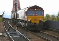 Coal train for Longannet power station drifting down from the Forth Bridge towards North Queensferry in April 2005. Note the cameraman in the cab!<br><br>[John Furnevel 28/04/2005]