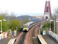 A Fife circle train restarts from Dalmeny on 30 April 2005 and heads out onto the Forth Bridge.<br><br>[John Furnevel 30/04/2005]