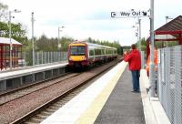 Byeeee..... Off on a train to Glasgow on 9 May 2005 - from the new Gartcosh station! <br><br>[John Furnevel 09/05/2005]