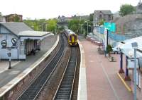 Train from Edinburgh arriving at Inverkeithing on 11 May 2005. The excavation work underway on the right is in connection with station access improvements.<br><br>[John Furnevel 11/05/2005]