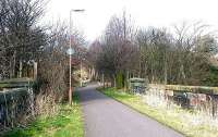 Looking north across the bridge carrying the former Granton branch across the Water of Leith on the approach to Warriston Junction in March 2003. <br><br>[John Furnevel /03/2003]