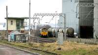 LaFarge cement works, Owellmains, south of Dunbar on Boxing Day 2004. The ECML runs through the centre of the picture and Torness nuclear power station can be made out in the background.<br><br>[John Furnevel /12/2004]