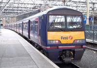 A North Berwick EMU formed by 322484 stands at Edinburgh Waverley on 26 July 2010.  <br><br>[Andrew Wilson 26/07/2010]