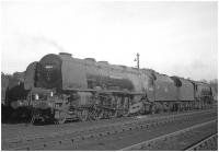 A striking pair of Stanier <I>Coronation</I> Pacifics standing ready for the road at Kingmoor shed in the early sixties. Nearest the camera is 46244 <I>King George VI</I> with 46257 <I>City of Salford</I> beyond.<br><br>[K A Gray //]