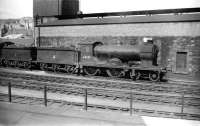 Reid D30 <I>Scott</I> class 4-4-0 no 62425 <I>Ellangowan</I> standing alongside Hawick shed in May of 1958. Built in 1914, the locomotive was withdrawn some 3 months after the photograph was taken and disposed of through Motherwell Machinery & Scrap, Wishaw, in February 1960.<br><br>[Robin Barbour Collection (Courtesy Bruce McCartney) 03/05/1958]