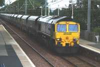 Freightliner 66506 runs south through Barassie station with coal empties on 27 July 2010.<br>
<br><br>[Colin Miller 27/07/2010]