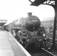 Polmadie standard Class 5 4-6-0 no 73059 with an up train at Carstairs station in 1965.<br><br>[Jim Peebles //1965]
