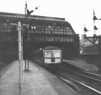 A DMU leaves Princes Street in 1965, the station's final year of operation.<br><br>[Jim Peebles //1965]