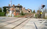 View north over the level crossing at Burton Agnes (closed 1970) on the Yorkshire coast line in April 2009, looking towards Bridlington. A station that appears to have had its ups and downs...<br><br>[John Furnevel 21/04/2009]