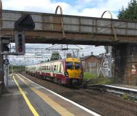 334 016 pulls into the up main platform 1 at Motherwell on 14 August with a service to Lanark.<br><br>[David Panton 14/08/2010]