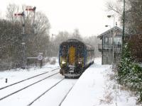 A Norwich service calls at a snowy Brundall in 2005.<br><br>[Ian Dinmore 04/03/2005]