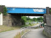 View north on 23 June 2010 showing a locally decorated section of the Kelvinhaugh Viaduct crossing Castlebank Street.<br><br>[Alistair MacKenzie 23/06/2010]