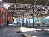 Inside the 1882 NER station at Tynemouth in August 2010 looking from the main concourse over the abandoned excursion platforms towards Newcastle. While there appears to have been little change with regard to the poor state of some of the canopies in the past 28 years [see image 20686], happily, funding is now in place for the COMPLETE restoration of the roof.<br>
<br><br>[Colin Alexander 18/08/2010]