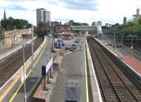Looking south over Motherwell station on 14 August 2010. Main line <br>
platforms are on the left, with Hamilton Circle platforms 3 and 4 and then stabling at the far right. Platform 3 is considerably longer than Platform 4, but having no main line services is rather unlikely to see its full 12-carriage length filled! <br>
<br><br>[David Panton 14/08/2010]