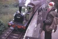 Early days on the KWVR as J72 0-6-0T 69023 <I>Joem</I> gets ready for departure with a service for the branch terminus at Oxenhope. 69023 has recently been restored to full working order and is in the care of the North Eastern Locomotive Preservation Group. <br><br>[Mark Bartlett /05/1969]