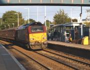 A loco-hauled Fife outer circle service calling at Dalgety Bay on 2 September 2010 behind EWS 67021.<br><br>[Brian Forbes 02/09/2010]