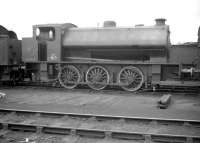 WD165 photographed in the yard at Kingmoor  on 1 August 1959. The ex-WD 0-6-0ST (AB 2183 of 1943) was on its way north to Steeles of Hamilton, from where it was eventually acquired by the Wemyss Private Railway and renumbered 15 [see image 6246]. Several years later, following a spell in Muir's yard in Thornton, the locomotive was purchased for preservation. It is currently undergoing a scheduled overhaul on the East Lancashire Railway, where it carries the name <I>Earl David</I>.<br><br>[Robin Barbour Collection (Courtesy Bruce McCartney) 01/08/1959]
