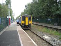 After picking up passengers at Burscough Junction station on 6 September 2010, unit 153315 gets ready to continue on its journey from Ormskirk to Preston. On the disused platform on the right (the former Liverpool platform) work has been progressing following the tidy up and the construction of a number of raised beds by the Friends of Burscough stations voluntary group.<br>
<br><br>[John McIntyre 06/09/2010]