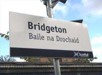 Scotrail's programme of Gaelic education by station nameboard rolls <br>
on.I assume there's no serious suggestion here that Bridgeton was ever known as Baile na Drochaid. This would be transliterated as <br>
Balnadrochit and means 'town of the bridge'. The settlement was far <br>
more likely established when the area was English/Scots speaking, but there are plenty of real Gaelic-based names around such as the next two stations along the line: Dalmarnock and Rutherglen. <br><br>[David Panton 11/09/2010]