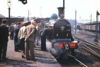 <I>'Now then, now then, no kissing the locomotive please...'</I>  A couple of steam fans seem to be getting a bit too <I>'up close and personal'</I> at Buchanan Street on 10 May 1958 as CR 123 waits to take out a special.<br><br>[A Snapper (Courtesy Bruce McCartney) 10/05/1958]