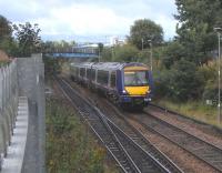 170 416 nears the end of its climb to Cowlairs with the 0915 to <br>
Edinburgh on 11 September.  It is crossing the points at Cowlairs South, the junction for the cord to Sighthill West Junction used by services via Cumbernauld.  Like other EGML junctions it had lighting installed last year.  Railways had managed 180 years without 'street' lighting: let's see if it catches on.<br><br>[David Panton 11/09/2010]