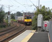 314 208 approaches Port Glasgow with a Gourock to Glasgow service on 1 September 2010<br><br>[David Panton 01/09/2010]