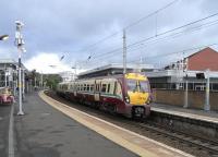 334 032 stands at Partick on 11 September with a Dalmuir to <br>
Springburn service. Off-peak the hourly pattern this way is 2 <br>
Springburns, 4 Airdries, 2 High Streets, 2 Larkhalls, 2 Motherwells -<br>
one each way round the Hamilton Circle, and 2 Lanarks - one direct and one via Holytown. With return workings that means 28 departures an hour from this 2-platform station, rising to over 30 at peak times.<br><br>[David Panton 11/09/2010]