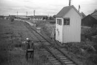 A view from the south end of Forres in 1969. The west to south curve was closed to all traffic in 1966, from east to south and on to Dallas Dhu siding was open until 1967. How strange the west to south curve had survived the east to south curve two years later.<br><br>[David Spaven //1969]