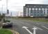 The large expanse of railway sidings that serviced Blackpool Central station until 1964 had long been known as Europe's largest car park, but in recent years has been improved and landscaped. This picture looks towards Central at the point where Bloomfield Road sidings were situated. The traffic lights mark the site of the former Bloomfield Road bridge that spanned the tracks and was only removed a few years ago. The white building is the home of Blackpool Football Club, back in the top flight in 2010/11 for the first time since 1971. [See image 30063] for a direct Then and Now comparison at the same location half a century earlier.<br><br>[Mark Bartlett 11/08/2010]