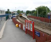 158794 arrives at Accrington with a Blackpool North to York service <br>
on 29 July 2010. The photo looks west towards Blackburn. On the left is a Tesco store under construction on the former route towards Helmshore, Ramsbottom and Bury.<br><br>[John McIntyre 29/07/2010]