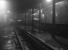 Inside Carstairs shed looking out into the darkness of 3 January 1964. Star attraction on this occasion is Gresley A4 no 60011 <I>Empire of India</I>. The Pacific, which had been reallocated from Haymarket to Ferryhill in June 1962, had most likely worked into Carstairs on the afternoon 'Postal' from Aberdeen.<br><br>[Robin Barbour Collection (Courtesy Bruce McCartney) 03/01/1964]