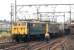 E26029 and E26016 pass Wombwell Main Junction with a Wath Yard to Fiddlers Ferry Power Station MGR coal train in July 1971. There would have been another pair of class 76s assisting in the rear for the ascent of Worsborough Bank.<br>
<br><br>[Bill Jamieson 21/07/1971]