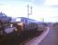 A car train photographed at the west end of Bathgate station, thought to have been taken in 1969. The train is probably the 4S42 ex-Dagenham, on this occasion conveying Mk 2 Ford Cortinas, the favoured choice of many a notable railway photographer of the period [see image 29963]. <br><br>[Jim Peebles //1969]