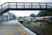 A rainy day at Betws-y-Coed in July 1991 as a dmu departs from the solitary remaining platform bound for Llandudno. To the right is the Railway Museum.<br>
<br><br>[Colin Miller /07/1981]