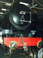 6115 <I>Scots Guardsman</I> in the display shed at the former Dinting Railway Centre on 5 January 1980. Other locomotives on display that day included no 60019 <I>Bittern</I> that can just be seen sitting on the adjacent road. <br><br>[David Pesterfield 05/01/1980]