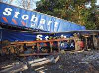 Wrecked Stobart Rail containers, photographed following the Carrbridge derailment in January 2010.<br><br>[John Gray /01/2010]