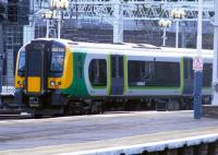 <I>Desiro</I> unit 350 232 in London Midland livery departing London Euston in July 2009. <br><br>[Colin Harkins 13/07/2009]