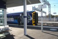 The 11.24 service to Edinburgh Waverley about to commence its journey from the new Bathgate station on 20 October 2010. The additional roads beyond the (as yet) unused westbound platform are part of the ScotRail light maintenance depot recently constructed on the south side of the line. <br><br>[John Furnevel 20/10/2010]