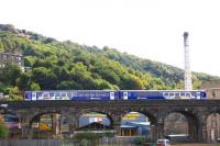 A service for Rochdale passes over Beacon Hill Viaduct, just to the north of Halifax station, on 28 September 2009.<br><br>[Ian Dinmore 28/09/2009]