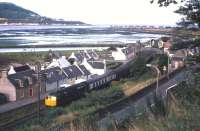 A northbound train from Inverness snakes through Clachnaharry village in the late 1960s.<br><br>[Frank Spaven Collection (Courtesy David Spaven) //]