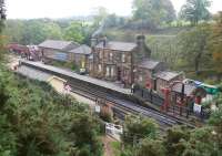 View over Goathland station on 14 October 2009. The flags, window tape, old posters, sandbags etc are all part of the preparations for one of the NYMR <I>Wartime Weekends</I>.<br><br>[John Furnevel 14/10/2009]