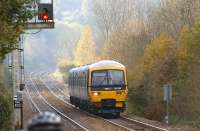 FGW DMU 165109 arrives at Gomshall station on the North Downs in a sylvan setting on 30 October 2010. The service is heading to Redhill from Reading and is on the boundary between Guildford and Reigate Signalling Centres.<br><br>[John McIntyre 30/10/2010]