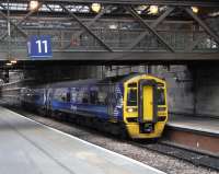 One of the few 400hp 158s, No 868 spent a considerable time in Scotland in its Alphaline colours before finally being turned out in Saltire livery. It still however has the rather ineffectual LCD destination display and no automatic journey information inside. It stands at Waverley's Platform 10 on 24 November with a Bathgate service in the last weeks of diesel operation.<br><br>[David Panton 24/11/2010]