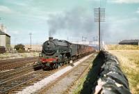 B1 4-6-0 no 61357 takes a westbound freight through Saughton Junction in August 1959. From the setting of the junction signal the train is about to cross over to the Fife lines and head north.<br><br>[A Snapper (Courtesy Bruce McCartney) 26/08/1959]
