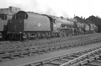 Scene on Kingmoor shed in June 1962 with Stanier Pacific no 46201 <I>Princess Elizabeth</I> nearest the camera and <I>Crab</I> no 42882 standing beyond.<br><br>[K A Gray 07/06/1962]