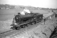 Class D34 4-4-0 no 62471 <I>Glen Falloch</I> at Greenlaw during the BLS <I>Scott Country Railtour</I> on 4 April 1959.<br><br>[Robin Barbour Collection (Courtesy Bruce McCartney) 04/04/1959]