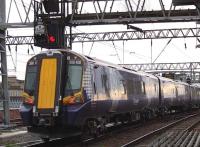 380106 departing Glasgow Central on a driver training run on 17th November 2010.<br><br>[Graham Morgan 17/11/2010]