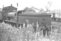 Hawick D34 4-4-0 no 62484 <I>Glen Lyon</I> simmers on Canal shed, Carlisle, in the summer of 1961. The locomotive had arrived at Hawick shed from Perth following a period in store at Dundee West [see image 28841]. Final withdrawal from Hawick came at the end of November 1961.<br><br>[K A Gray 01/07/1961]